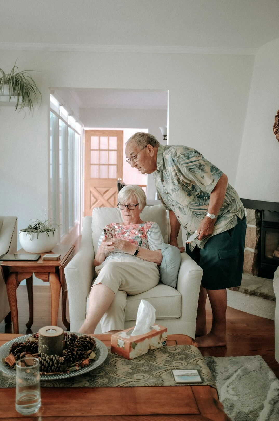 grandparents and grandchildren watching tv